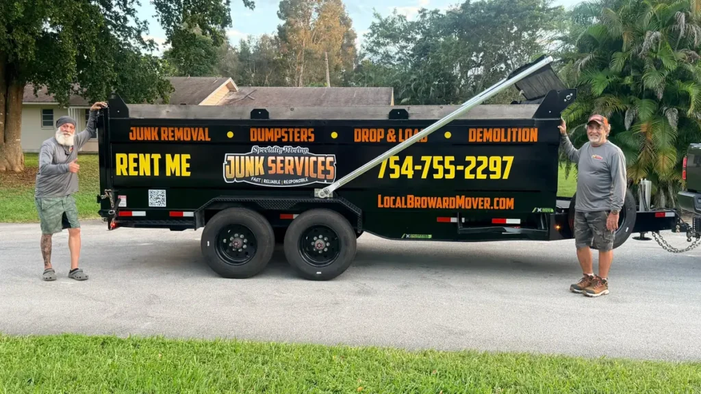 Specialty Moving Junk Services crew with dump trailer ready for a junk removal pickup